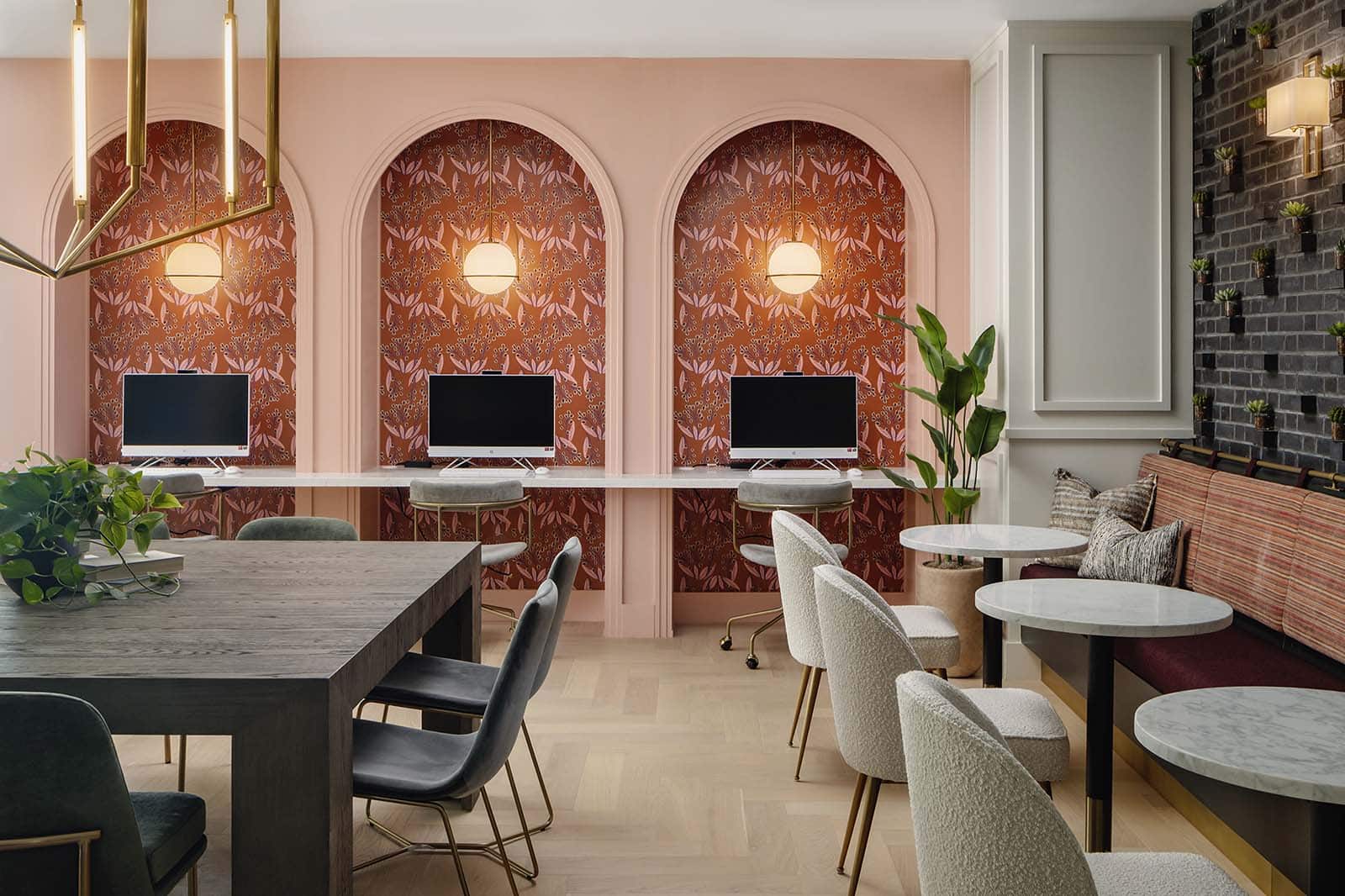 Commercial lounge with patterned wallcovering and arched alcoves
