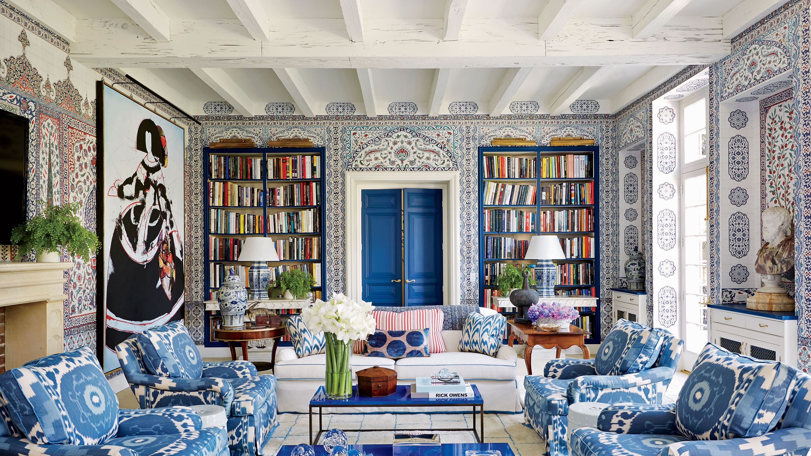 Sophisticated living room finished with patterned designer wallpaper